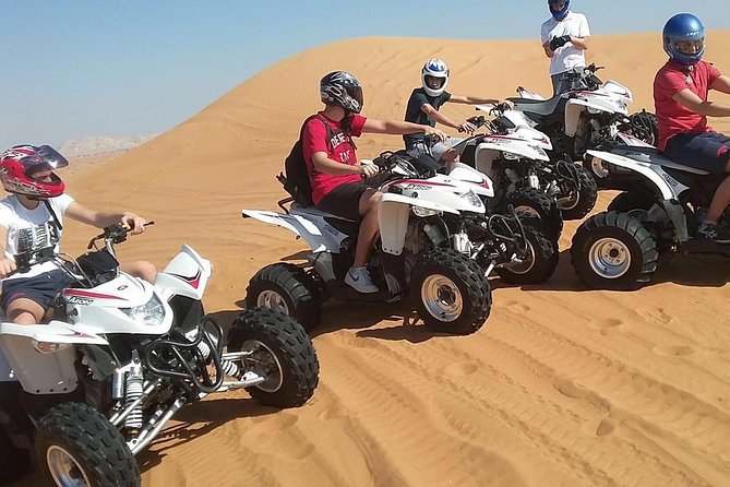 6-Hour Dubai Desert Safari with BBQ Dinner & Quad Biking - The Desert Camp Culture Loop: Henna, Tanoura, Belly Dance, Fire