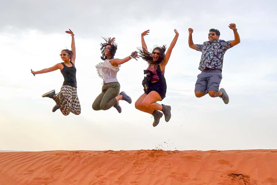 Abu Dhabi: Morning Desert Tour, Camel Ride & Sandboarding - Camel ride and photo stops: the calmer finale