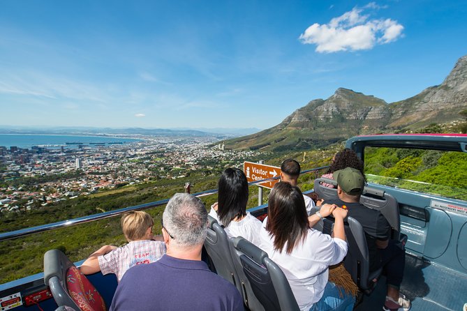 Cape Town Hop-On Hop-Off City Tour with Optional Cruise - After Table Mountain: Camps Bay energy, Sea Point pacing, lighthouse views