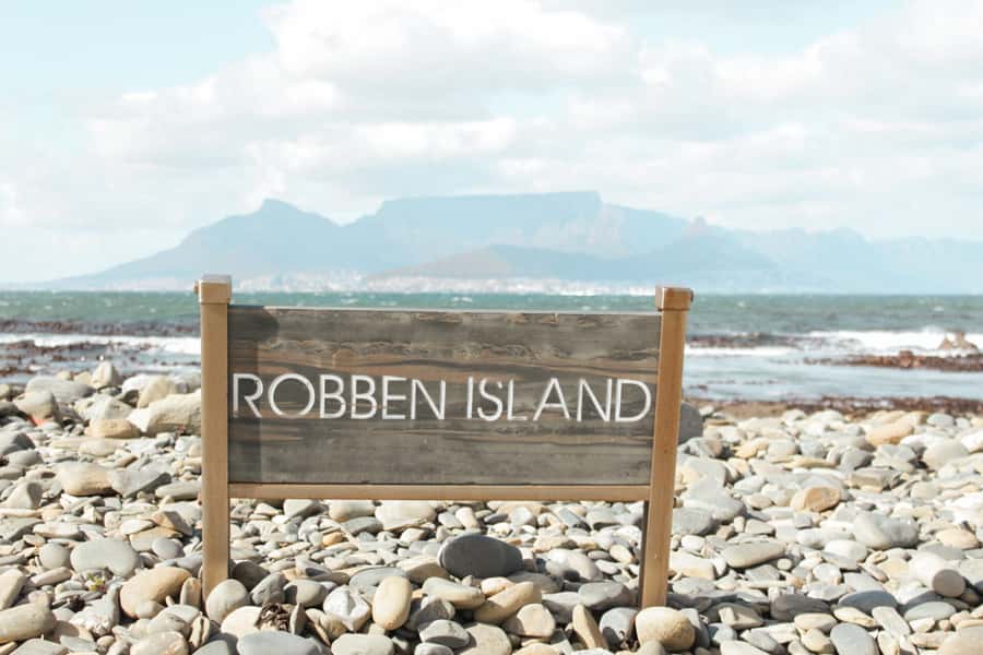 Cape Town: Robben Island Ferry Tour with 1-Way Hotel Pickup - How the day flows: pickup, ferry, bus tour, prison cell