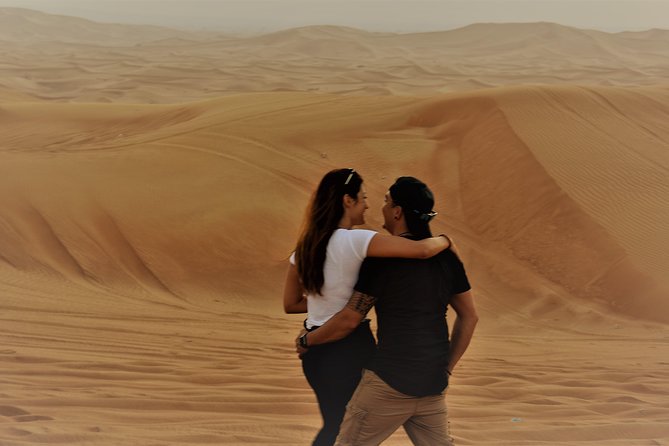 Desert Safari Tour, Quad Bike with BBQ Dinner & Show from Dubai - Sandboarding: Fun, With One Warning