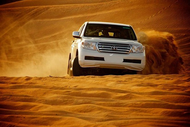 Doha :Half Day Desert Safari | Camel Riding | ATV | Sand Surfing - Getting Out of Doha: The 4WD Drive That Sets the Tone