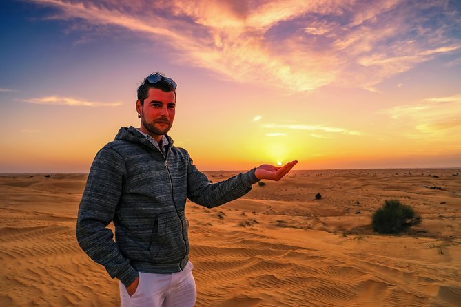 Dubai Desert Discovery: Red Dunes Safari, Sandboard & Camel Ride - First Stop at Lahbab: Camel Ride and Photo Break