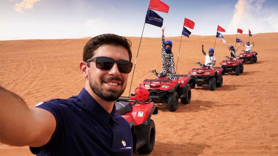 Dubai Desert Safari - Camel Ride, Sandboarding & 30 Min Quad - The Lahbab Base Stop: Tire Deflation, Photos, and the Tiny Camel Moment