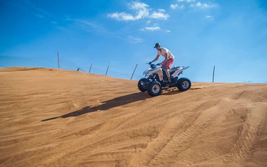 Dubai: Desert Safari, Quad Bike, Camel Ride and Sandboarding - Quad bike option: thrilling, but read the rules before you ride