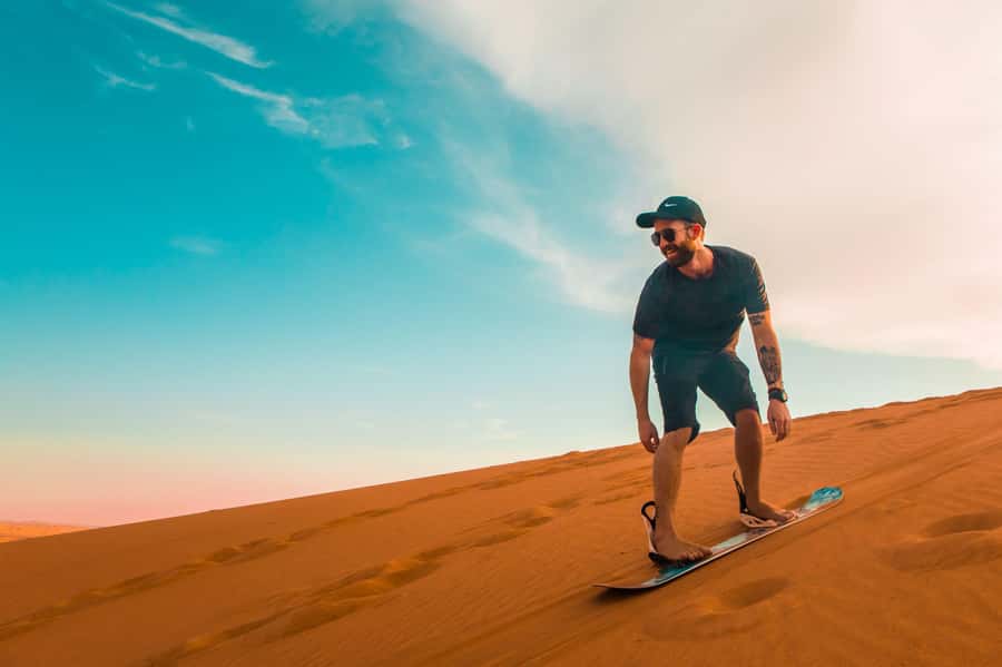 Dubai: Desert Safari, Quad Bike, Sandboarding, Camels & BBQ - Getting To The Lehbab Desert: Pickup, Tire Pressure, and That First Stop