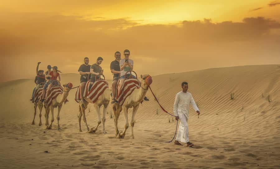 Dubai: Desert Safari, Quad Bike, Sandboarding, Camels & BBQ - Sandboarding on Red Dunes: The Fun Skill You Don’t Need Training For