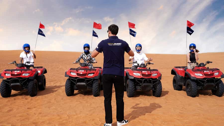 Dubai Desert Safari - Sandboarding, Quad Bike & BBQ Options - Sandboarding and the camel ride: the desert’s fun side