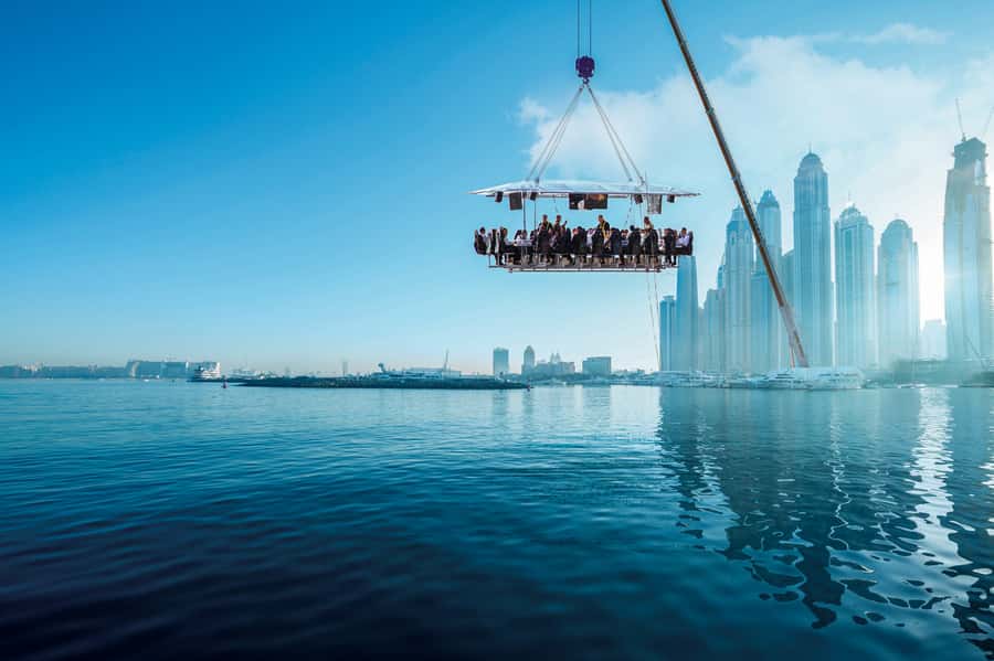 Dubai: Dinner in the Sky Experience - Skydive Dubai to the Crane Table: getting strapped in at Mina Al Seyahi