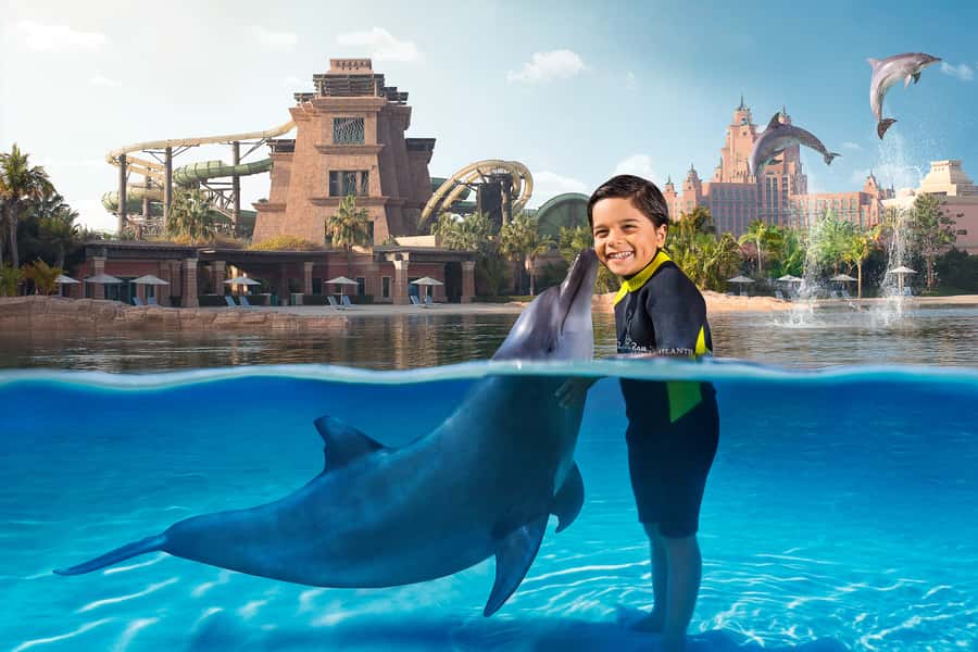 Dubai: Dolphin Encounter & Aquaventure Waterpark Ticket - Meet the dolphins like Tina, Aladin, Maui, or Lilly: what interaction really means