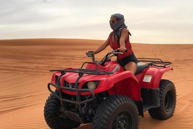 Dubai Dunes Safari With Quad Bike, Camel Ride, BBQ Dinner & Live Shows - BBQ dinner with included drinks, plus belly dance, tanura, and fire dance