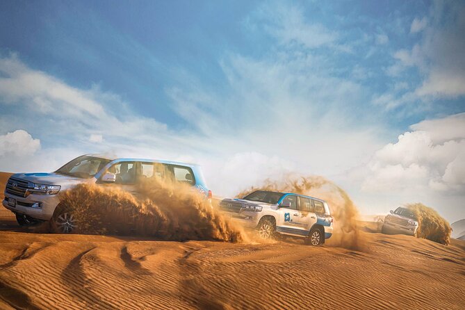 Dubai: Half-Day Desert Safari, Camels, Quad Bike & Refreshments - The 4WD ride into Lahbab: safety and photo timing