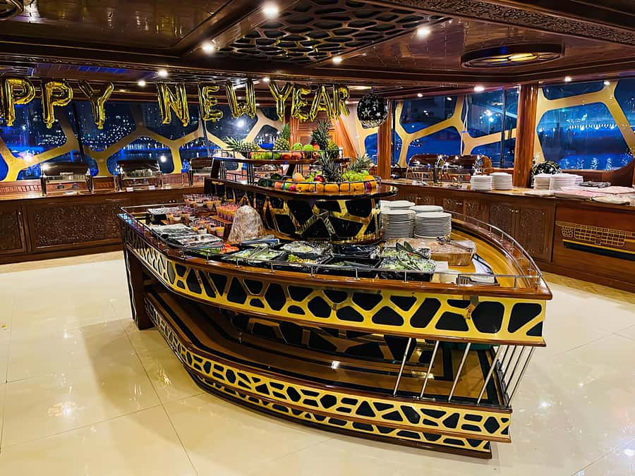 Dubai Marina: Dinner Cruise in a Traditional Boat - Live Entertainment and DJ Energy Across Four Decks
