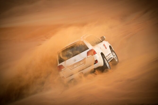 Dubai Morning Desert Safari with Quad Biking & More Activities - Sandboarding After the Ride: The Fun Skill That Doesn’t Require Training