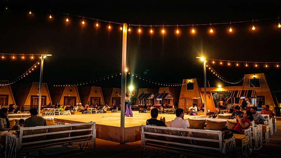 Dubai: Premium Red Dune Safari with Sandboarding & BBQ - Transition to the Bedouin Camp: Snacks, Camel Ride, and a Slower Pace
