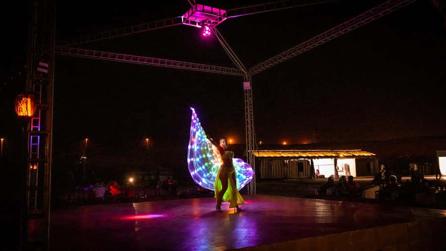 Dubai: Premium Red Dune Safari with Sandboarding & BBQ - Belly Dancing, Fire Show, and Tanoura Dance: The Evening Peak