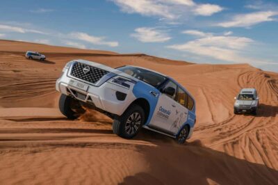 Dubai: Premium Safari, Camel Ride & Al Khayma Camp 3-Buffets - Lahbab Dunes: Dune Bashing, Sandboarding, and Photo Stops