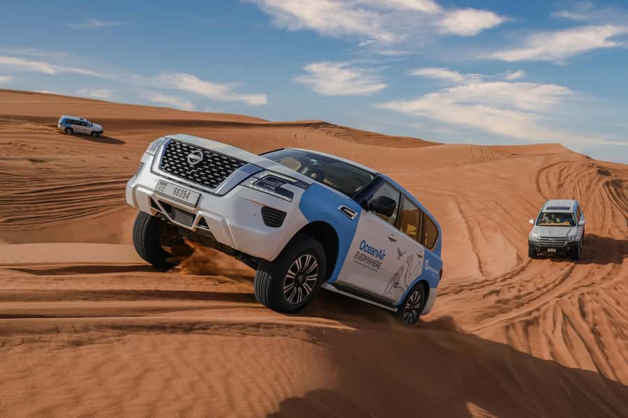 Dubai: Premium Safari, Camel Ride & Al Khayma Camp 3-Buffets - Lahbab Dunes: Dune Bashing, Sandboarding, and Photo Stops