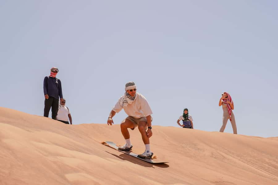 Dubai: Red Dune Desert Safari, Quad Bike, Camels, and BBQ - Quad biking through the dunes: optional, self-driving, and serious