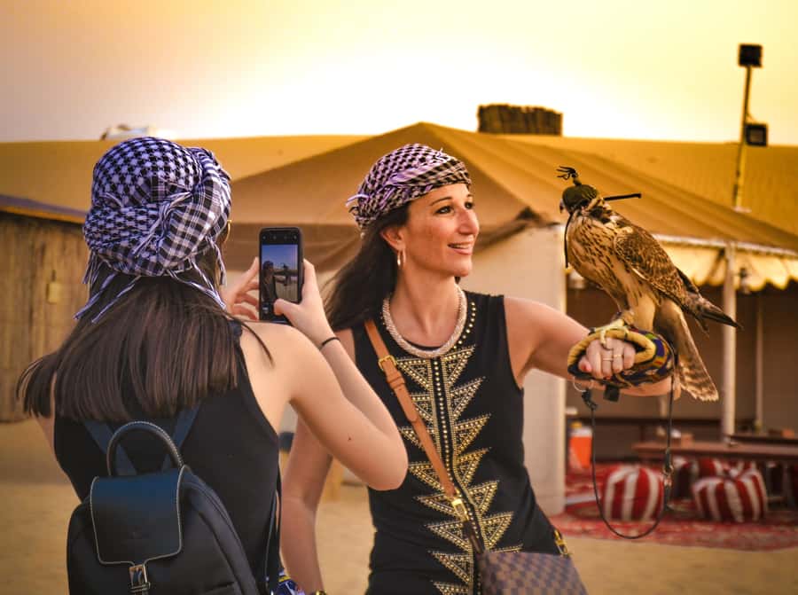 Dubai: Red Dune Desert Safari, Quad Bike, Camels, and BBQ - Falcon photos and early stops: quick moments, good payoff
