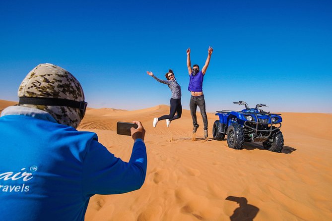 Dubai Red Dunes ATV, Camels, Stargazing & 5<em> BBQ Al Khayma Camp – Key Things to Know Before You Go’ /></p>
<ul>
<li><strong>Real 60-minute quad/ATV session</strong> on Lahbab red dunes, with a helmet and safety briefing</li>
<li><strong>Pickup and drop-off included</strong>, with an air-conditioned vehicle and camp transfers</li>
<li><strong>Small-group feel</strong> with a maximum of 15 travelers</li>
<li><strong>Al Khayma “elite” camp activities included</strong>: camel ride, henna (women), shisha, falcon photos, sweets/coffee</li>
<li><strong>Evening adds stargazing and the fire show</strong>, while earlier slots skip those parts</li>
<li><strong>ATV rules are serious</strong>: you’re responsible for your quad and any damage you cause</li>
</ul>
<h2 id="atv-power-on-lahbab-red-dunes-what-makes-this-feel-worth-it">ATV Power on Lahbab Red Dunes: what makes this feel worth it</h2>
<p> BBQ Al Khayma Camp – ATV Power on Lahbab Red Dunes: what makes this feel worth it’ /><br />
This is the type of Dubai desert safari that actually starts with the point. You’re heading to the Lahbab desert, famous for red-orange dunes that look great in photos and feel different under your tires than the flatter sand near some other spots.</p>
<p><p>The quad portion is the headline: after pickup, you’ll gear up with a helmet and get a safety talk from your instructor. Then you’ll ride for about an hour, following the guide over sandbanks and dune tracks. The best part is that you’re not just driving in circles. You stop for photos, and sandboarding is built into the same block of action, so you get multiple “I’m doing this in Dubai” moments instead of one long ride with nothing else.</p>
</p>
<p><p>A practical note: the tour is built for people who can handle basic driving. You must have basic driving knowledge, and you need to be at least 14 to ride. If you’re sharing an ATV, the sharing-bike option requires at least two passengers, or you may pay an additional charge if the group doesn’t work out to pairs.</p>
</p>
<div style="margin: 20px 0; padding: 15px 0;"><p>You can also read our reviews of more tours and experiences in Dubai.</p><ul style="margin: 10px 0; padding: 0; list-style: none;"><li style="margin: 0 0 10px 0; padding: 0 0 10px 0; border-bottom: 1px solid #eee; display: flex; align-items: flex-start; gap: 12px; line-height: 1.4;"><a href="https://travellersdestinationguide.com/dubai-burj-khalifa-levels-124-125-entry-ticket-options/" aria-hidden="true" tabindex="-1"><img decoding="async" style="width: 80px; height: 60px; object-fit: cover; border-radius: 4px; flex-shrink: 0;" src="https://travellersdestinationguide.com/wp-content/uploads/2026/06/dubai-burj-khalifa-levels-124-125-entry-ticket-options-150x150.jpg" alt="" loading="lazy"></a><div><a href="https://travellersdestinationguide.com/dubai-burj-khalifa-levels-124-125-entry-ticket-options/">Dubai: Burj Khalifa Levels 124 & 125 Entry Ticket + Options</a><br><span style="font-size: 0.82em; color: #555; margin-top: 2px;"><span style="color: #f5a623;">★</span> 4.3 &middot; 90,891 reviews</span></div></li><li style="margin: 0 0 10px 0; padding: 0 0 10px 0; border-bottom: 1px solid #eee; display: flex; align-items: flex-start; gap: 12px; line-height: 1.4;"><a href="https://travellersdestinationguide.com/dubai-desert-safari-quad-bike-camel-ride-al-khayma-camp/" aria-hidden="true" tabindex="-1"><img decoding="async" style="width: 80px; height: 60px; object-fit: cover; border-radius: 4px; flex-shrink: 0;" src="https://travellersdestinationguide.com/wp-content/uploads/2026/06/dubai-desert-safari-quad-bike-camel-ride-al-khayma-camp-150x150.jpg" alt="" loading="lazy"></a><div><a href="https://travellersdestinationguide.com/dubai-desert-safari-quad-bike-camel-ride-al-khayma-camp/">Dubai: Desert Safari, Quad Bike, Camel Ride & Al Khayma Camp</a><br><span style="font-size: 0.82em; color: #555; margin-top: 2px;"><span style="color: #f5a623;">★</span> 4.9 &middot; 68,962 reviews</span></div></li><li style="margin: 0; padding: 0; border-bottom: none; display: flex; align-items: flex-start; gap: 12px; line-height: 1.4;"><a href="https://travellersdestinationguide.com/dubai-desert-safari-quad-bike-camel-ride-and-sandboarding/" aria-hidden="true" tabindex="-1"><img decoding="async" style="width: 80px; height: 60px; object-fit: cover; border-radius: 4px; flex-shrink: 0;" src="https://travellersdestinationguide.com/wp-content/uploads/2026/06/dubai-desert-safari-quad-bike-camel-ride-and-sandboarding-150x150.jpg" alt="" loading="lazy"></a><div><a href="https://travellersdestinationguide.com/dubai-desert-safari-quad-bike-camel-ride-and-sandboarding/">Dubai: Desert Safari, Quad Bike, Camel Ride and Sandboarding</a><br><span style="font-size: 0.82em; color: #555; margin-top: 2px;"><span style="color: #f5a623;">★</span> 4.9 &middot; 43,505 reviews</span></div></li></ul></div><h2 id="pickup-timing-and-how-the-6-hours-actually-lands">Pickup, timing, and how the 6 hours actually lands</h2>
<p><img src=
