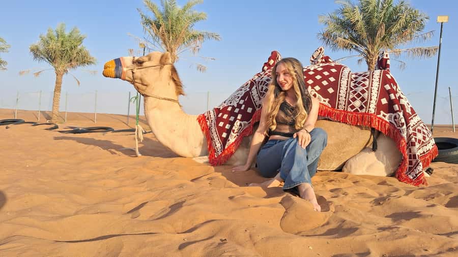 Dubai: Red Dunes Desert Safari with Premium Camp BBQ & Shows - The camel ride, falcon photos, and sandboarding stop-by-stop