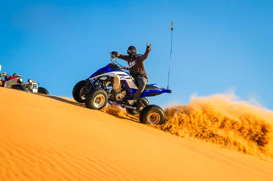 Dubai: Safari, Quad Bike, Camel Ride, and Buffet Dinner - Leaving Dubai for the Red Dunes: What Makes This Day Work