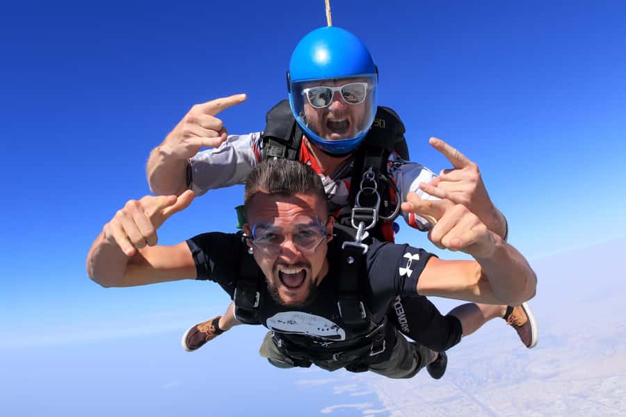 Dubai: Skydive at The Palm with Photos, Video & Yacht Tour - The Exit and Freefall: 13,000 ft, 120 mph, and 60 Seconds That Go Fast