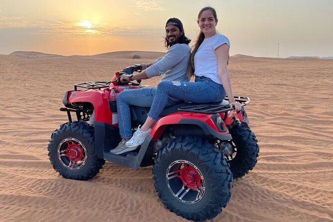 Evening Red Dunes Safari with Quad Biking, BBQ Dinner & LiveShows - Premium Desert Camp night: BBQ dinner, dress-up photos, and henna time