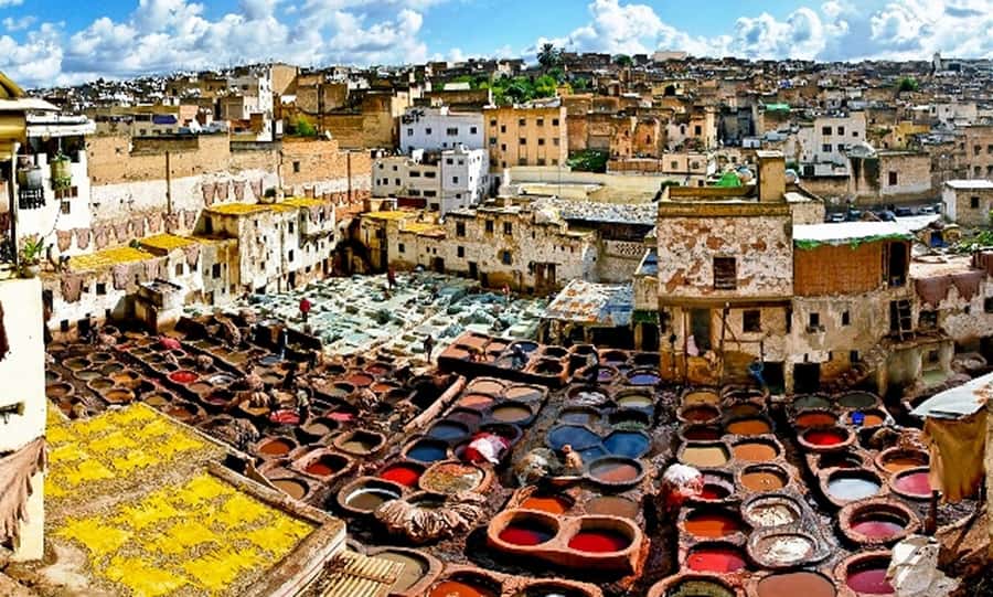 Explore Fes: Unforgettable Guided Walking Tour of the Medina - Souks, photo stops, and the kind of navigation you can use later