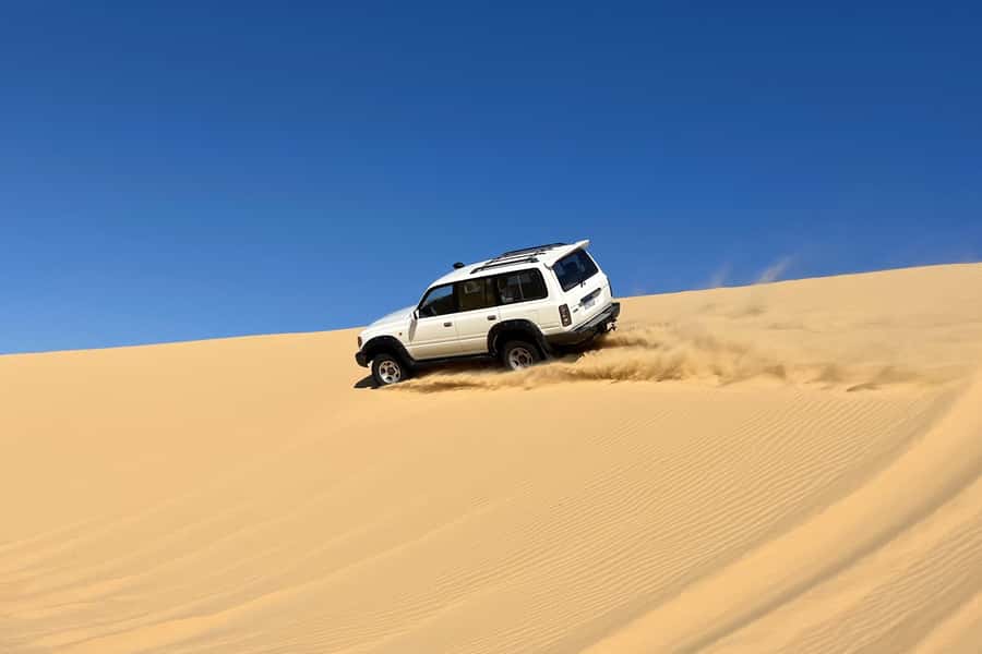 From Cairo: Desert Safari, Camel Ride, Magic Lake, & Lunch - Lunch at the Bedouin camp: BBQ and the rare quiet in the desert