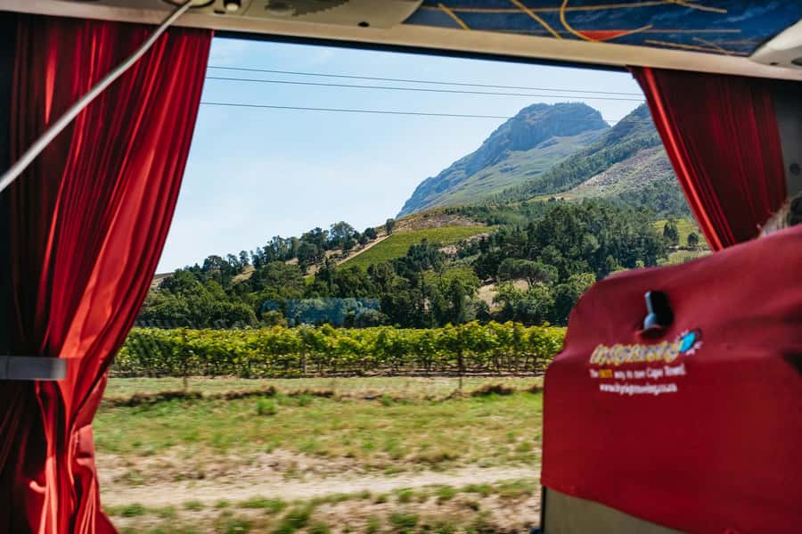 From Cape Town: 3 Regions Wine Tour with 3 Estates, 15 Wines - Drakenstein Prison photo stop: brief, but it lands