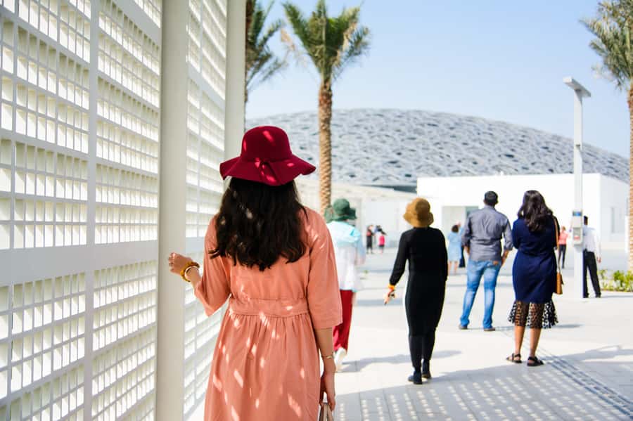 From Dubai: Abu Dhabi Grand Mosque & Louvre Museum Full-Day - Louvre Abu Dhabi on Saadiyat Island: self-guided time with a dome light show