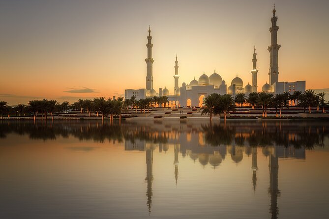 From Dubai: Abu Dhabi Sheikh Zayed Grand Mosque Guided Tour - Prayer hall and courtyards: how the reflective pools change the whole mood
