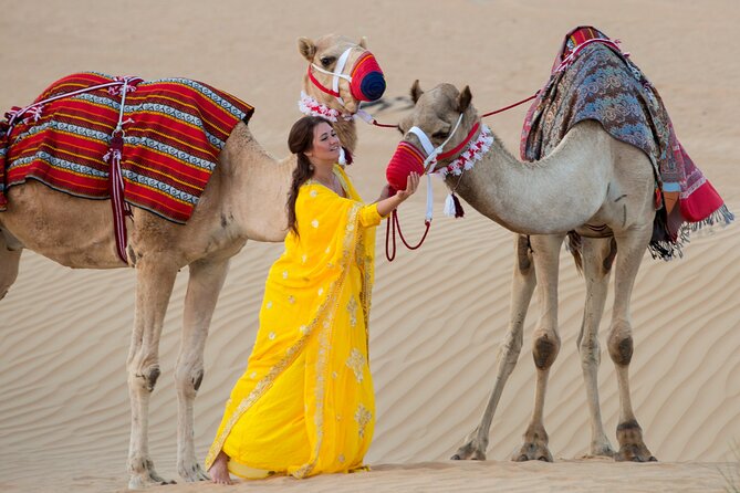 High Red Dunes with Camel Ride, Sandboarding, Falcon Show and VIP BBQ Dinner - Sandboarding: Turning the Dunes Into a Slide