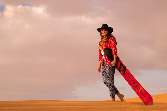 High Red Dunes with Camel Ride, Sandboarding, Falcon Show and VIP BBQ Dinner - Optional Quad Bikes: More Speed, More Decision-Making