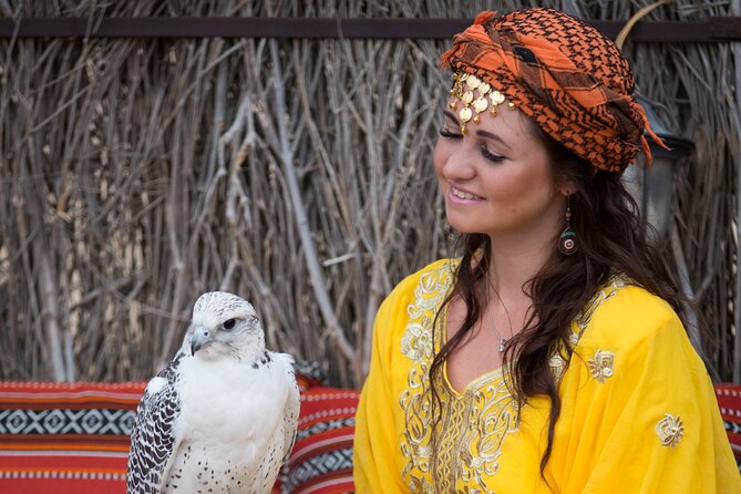 High Red Dunes with Camel Ride, Sandboarding, Falcon Show and VIP BBQ Dinner - Falcon Show and Falcon Photo: Timing and Season Matter