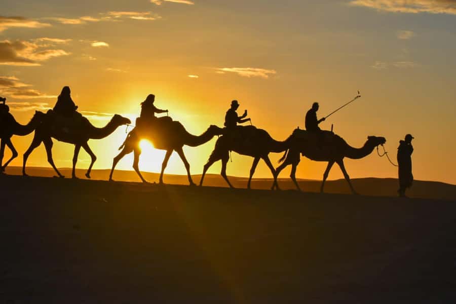 Marrakech: Agafay Desert Sunset, Camel Ride, and Dinner Show - Sunset at the Desert Camp: Sweets, Views, and the Moment You Came For