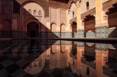 Marrakech: Ben Youssef, Secret Garden, & Souks Walking Tour - Jemaa el-Fnaa Square: Photo Stops, Street Energy, and a Reality Check