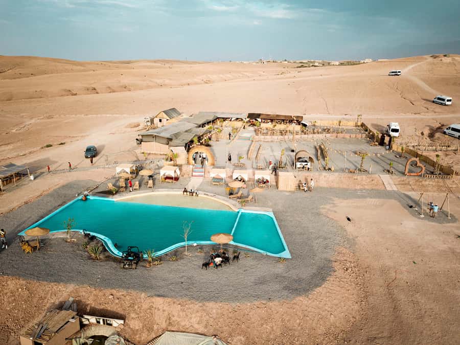 Marrakech: Camel Ride, Dinner, Pool, and Fire Show in Agafay - Pool time in the desert: a smart comfort move