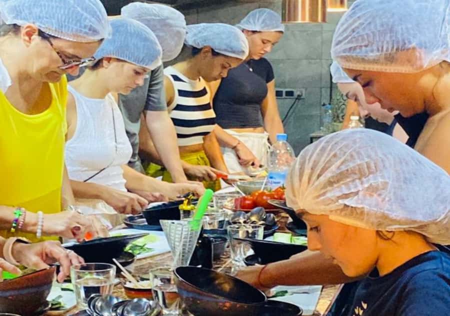 Marrakech: Moroccan Cooking Class with Pickup - Hotel pickup to the restaurant kitchen you can actually smell