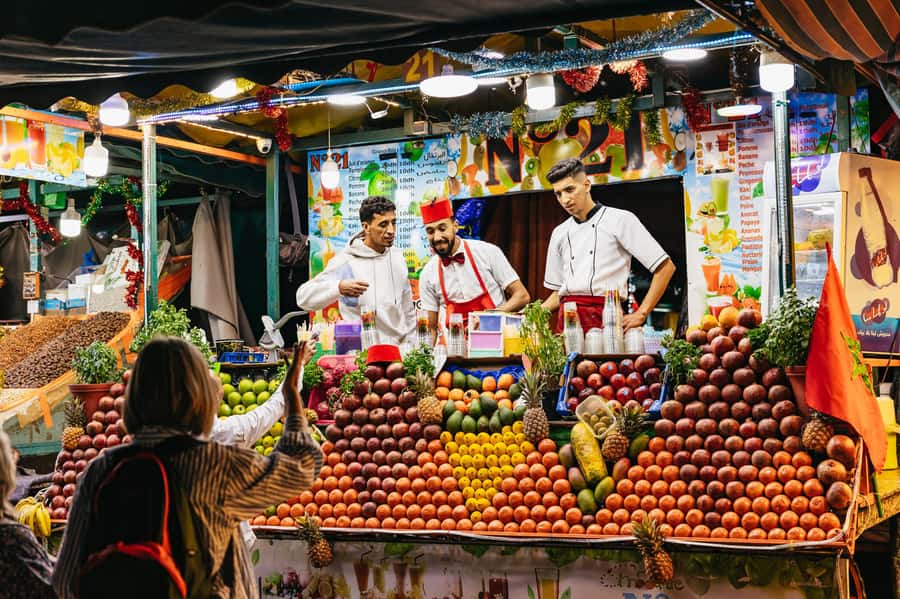 Marrakech: Street Food Tour by Night - Koutoubia Mosque Photo Stop and the Shift to Rooftop Relaxation