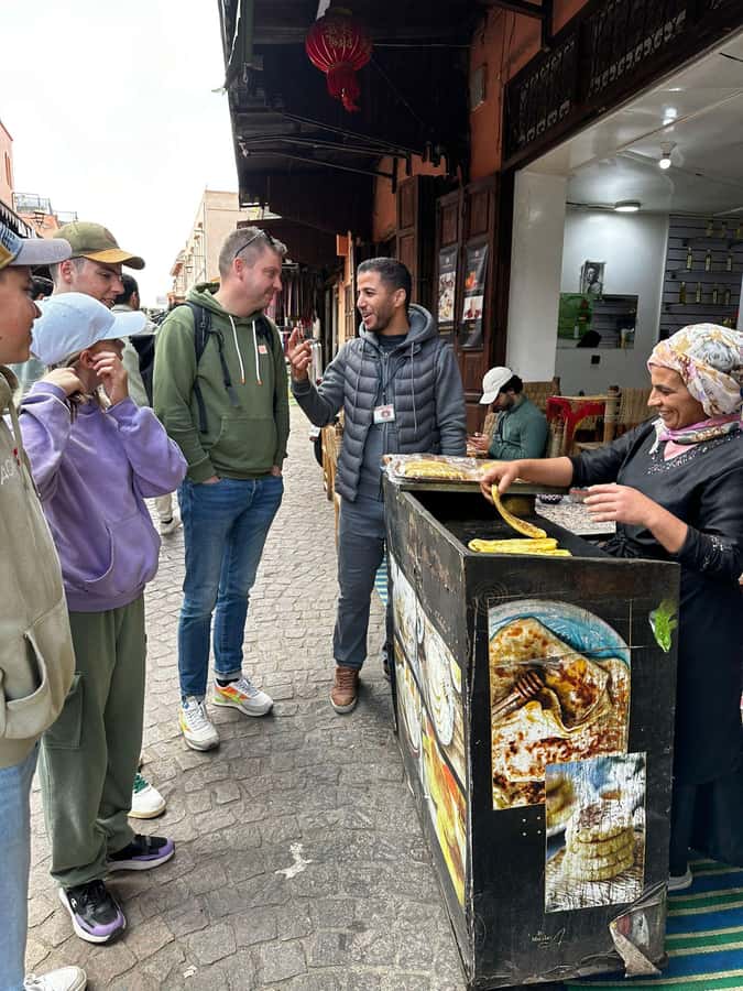 Marrakech: Street Food Tour with a Local Guide - Mellah photo stop and local snacks: tasting beyond the postcard