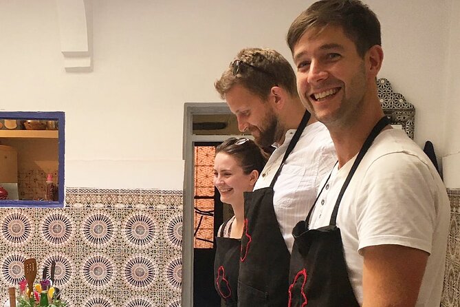 Moroccan Cooking Class & Marrakech Market Visit with Chef Khmisa - Team cooking in a real Moroccan kitchen (not a demo)