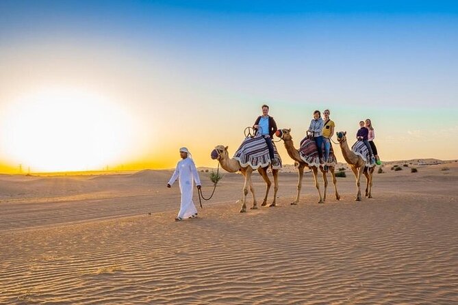 Red Dunes Desert Safari with 4x4 Pick up & Drop, Camel ride, BBQ and Live shows - BBQ dinner and live shows: what’s included, and what changes in Ramadan